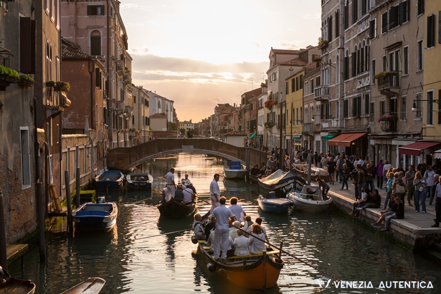 Fundraising Serenade on Rowing Boats in Venice, on the Canale della Misericordia at sunset