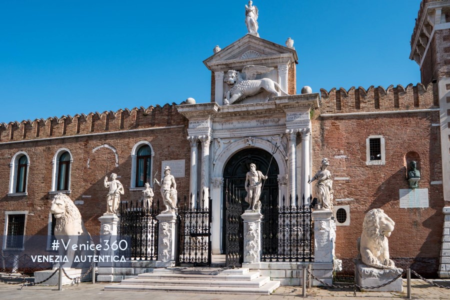 Entrance of the Arsenale of Venice in the Castello district. Statues of gods and lions.