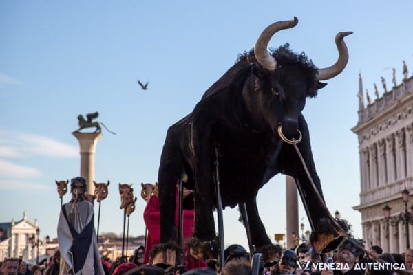 Bull statue in Saint Mark's Square in Venice during Carnival