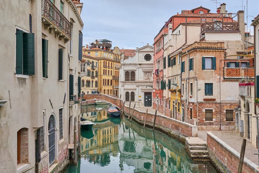 Photo of a canal in Venice, shot from a bridge