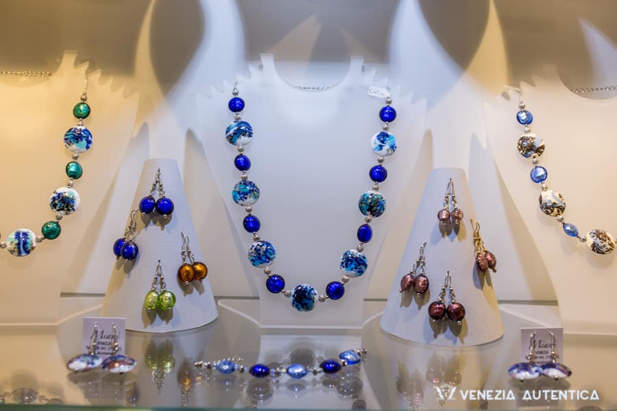 Miani Glass Jewels - Venezia Autentica | Discover and Support the Authentic Venice - Venice, Local Shop, Murano Glass beads: Elena and Nicola Miani in their shop offer quality Murano glass production ranging from beads to jewels and mosaics.