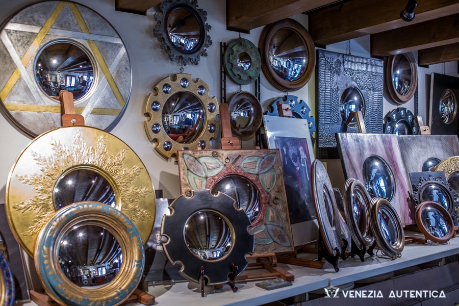Canestrelli Mirrors - Venezia Autentica | Discover and Support the Authentic Venice - Every mirror at Canestrelli's is a unique piece, which Stefano designs and creates entirely by hand in his workshop, carving and decorating the frames with the traditional "guazzo" gilding technique developed in the XIV Century, and finally silvering entirely by hand the convex mirror.