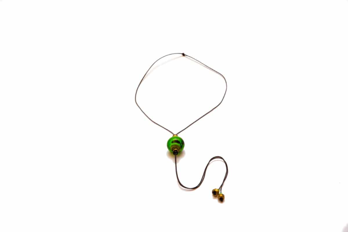 "Green Beat" Necklace Shop by Venezia Autentica - Shop by Venezia Autentica - Sleek necklace with a beautiful green Murano Glass pendant, designed and handmade in Venice, Italy. The pendant, crafted by lampworking, is unique and durable.