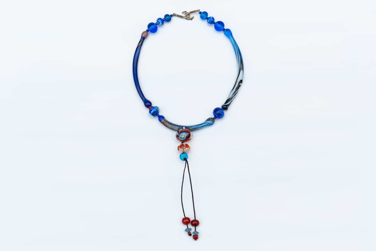 "Red and Blue Spell" Necklace Shop by Venezia Autentica - Shop by Venezia Autentica - Eye-catching blue and red Murano Glass necklace, designed and handmade in Venice, Italy. Beware, its unique colors and shapes make anyone fall in love with it!