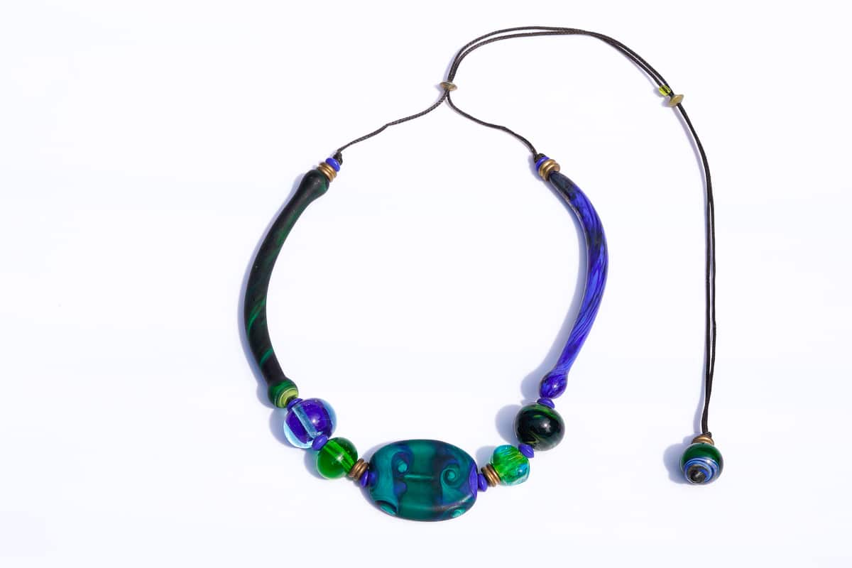 "Venice Callydria" Necklace Shop by Venezia Autentica - Shop by Venezia Autentica - Beautiful blue and green Murano Glass necklace, lampworked in Venice. The mix of incredible colors, shapes and elegance make it the perfect everyday accessory.